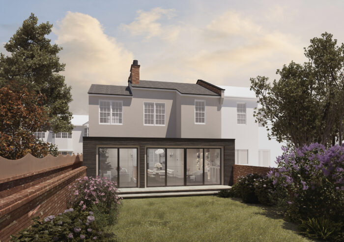 Charred timber single storey extension with sliding doors